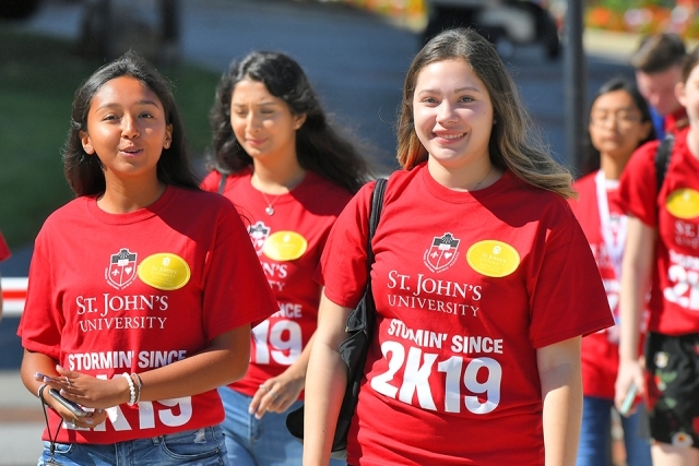 Group of students walking on campus