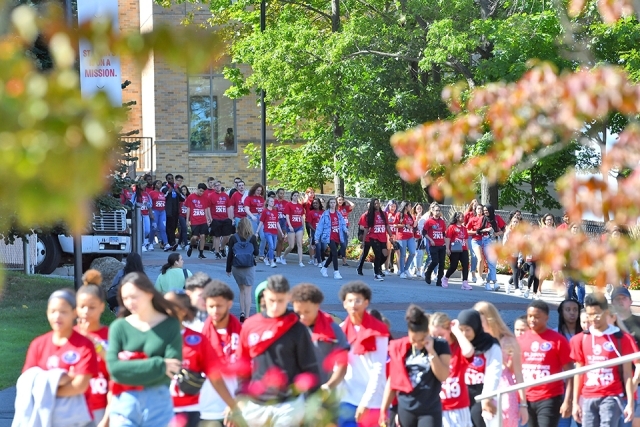 Group of students walking on campus