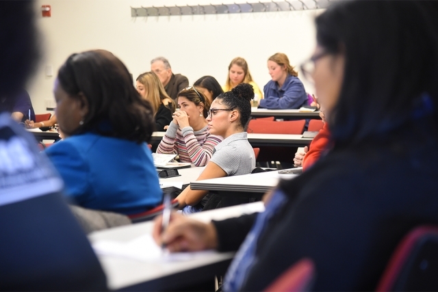 SJU Annual Catholic Lecture attendees listening