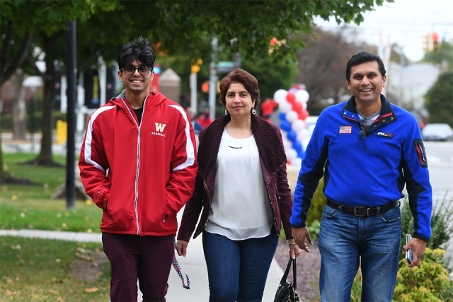 A family arriving to the event