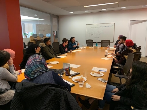 Students at a planning meeting.