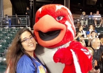 Johnny Thunderbird hugging a female