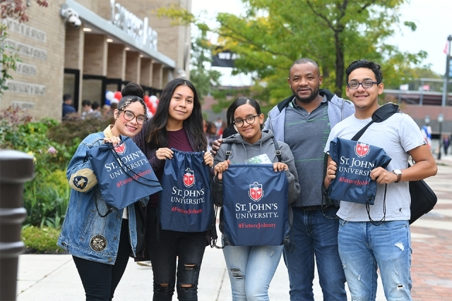 Family showing off gift bags