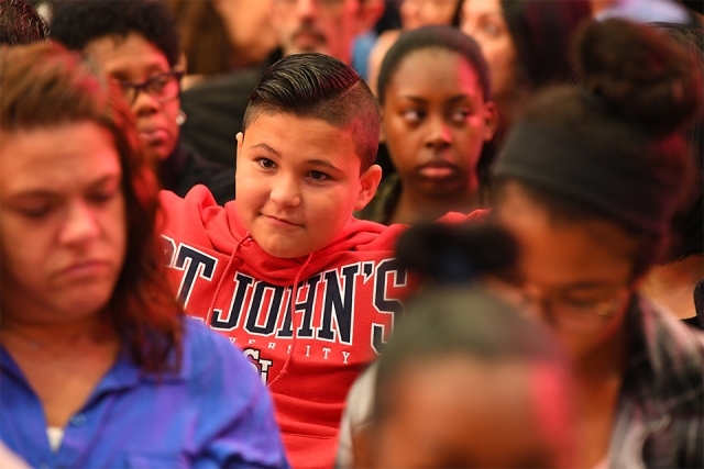 Future Johnny smiling in SJU sweatshirt