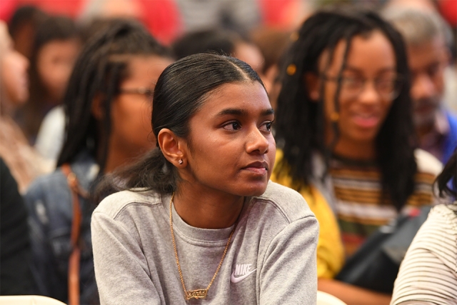 Guest in welcome crowd focusing