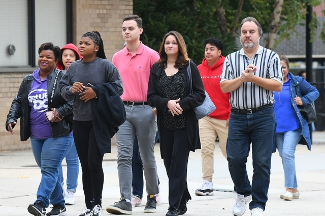 Guests walking to registration