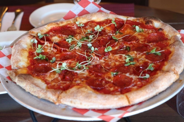 Pizza on tray in restaurant
