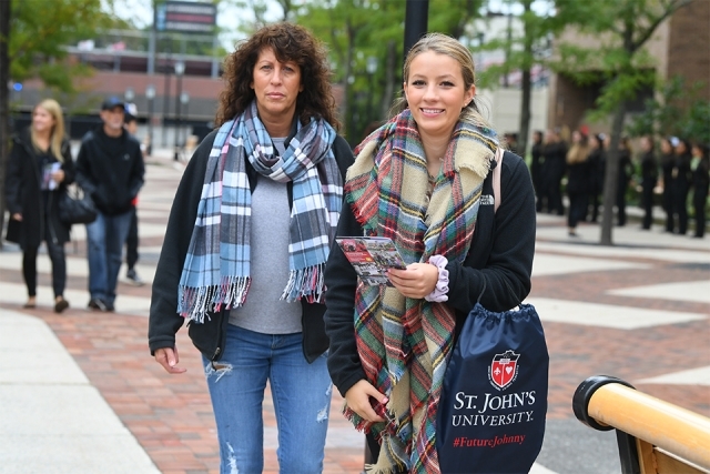 Mother and dauther smiling for camera 