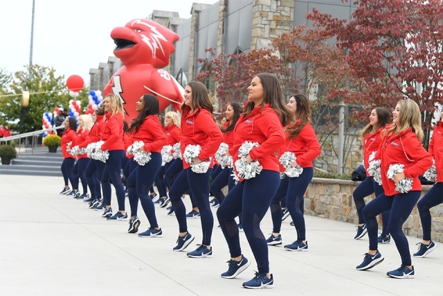 SJU cheer squad dancing