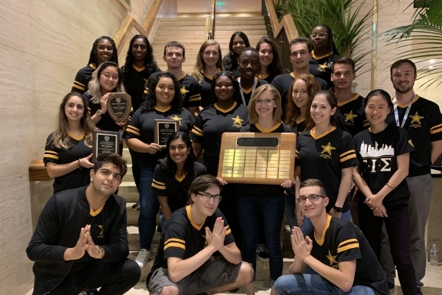 SRM Gamma Students holding award