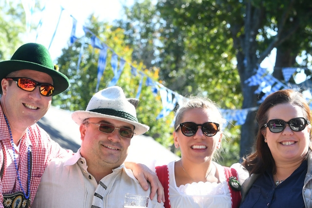 Oktoberfest attendees pose for a picture