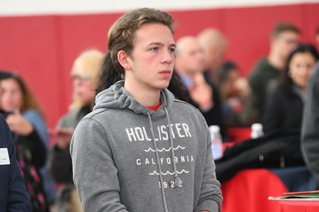 Student looking on at welcome