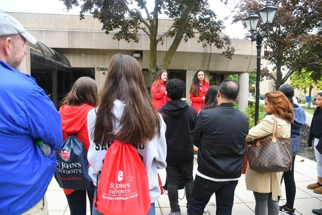 View from behind crowd on campus tour 