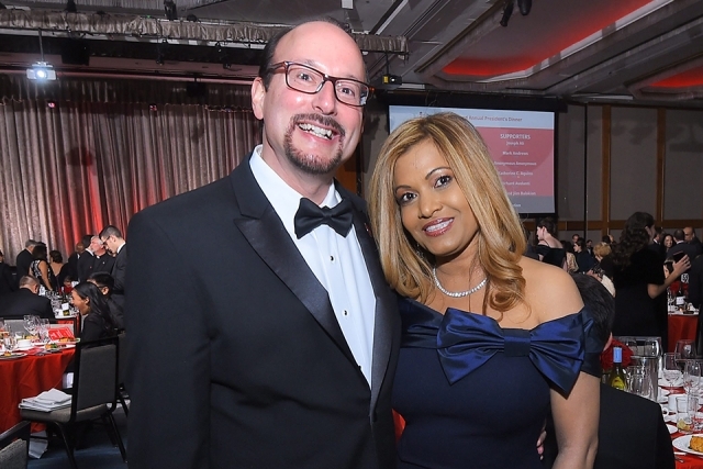 Two guests pose for a photo at the St. John’s University 2019 President’s Dinner