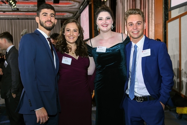 Four guests standing for a picture at the St. John’s University 2019 President’s Dinner