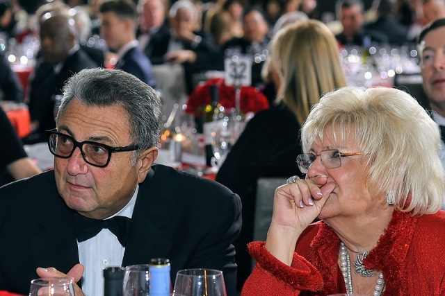 Two guests seated at the St. John’s University 2019 President’s Dinner