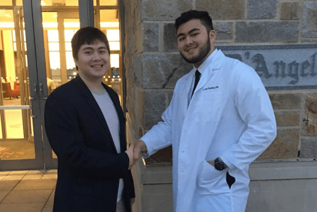 Defonzo Children Shaking Hands