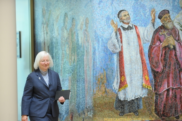 Julian Upton walking in lobby of church