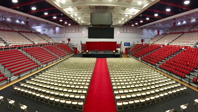 Empty carnesecca arena setup for commencement ceremony