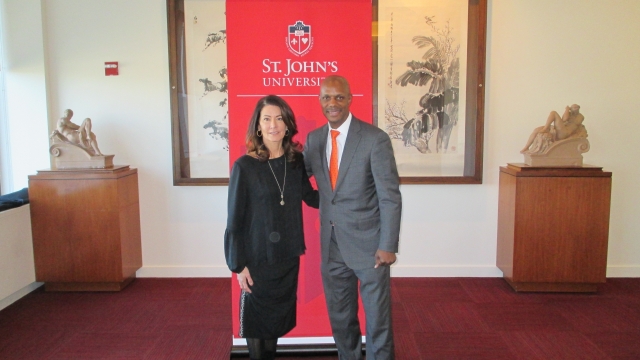 Regina Calcaterra and David Bell, Ed.D., Dean pose for a picture