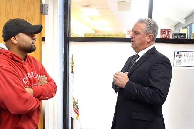 Kevin J. Killea ’88CBA and Luis Escobar speaking