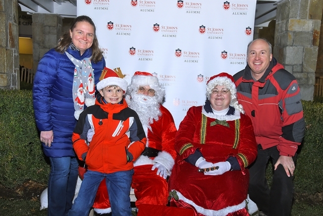 Santa and Mrs. Claus with attendees