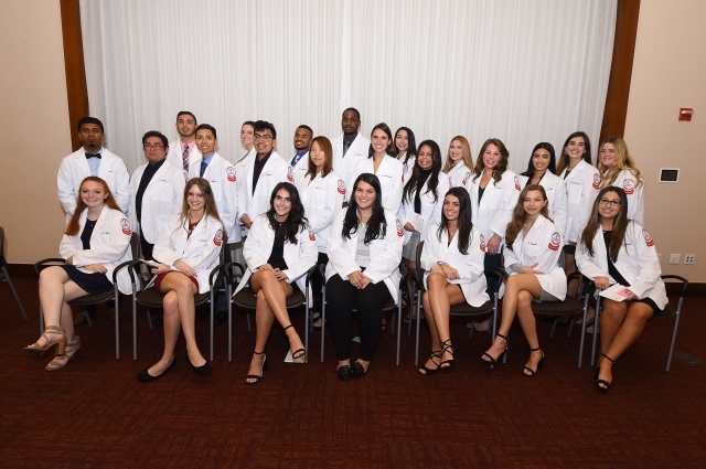 Aspiring Healthcare Professionals Don Their White Coats