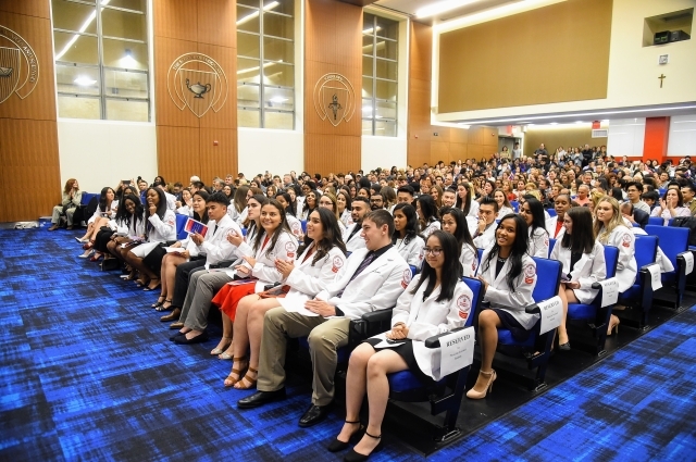 Aspiring Healthcare Professionals Don Their White Coats