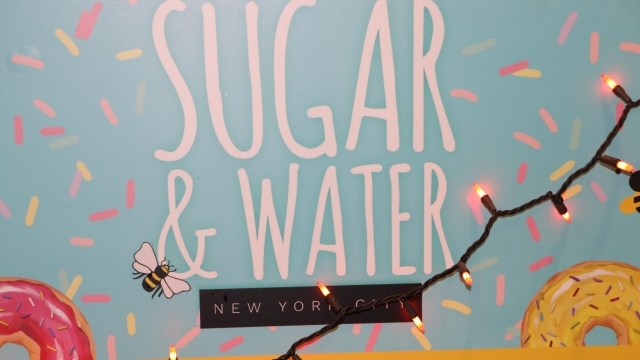 Sugar & Water NYC sign
