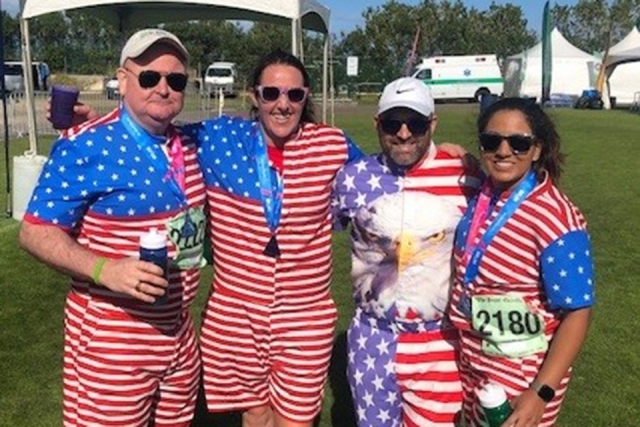 Kevin Maloney and friends posing for photo before a race