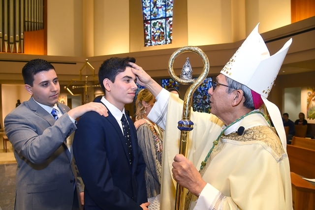 RCIA reception of sacraments in St. Thomas More Church