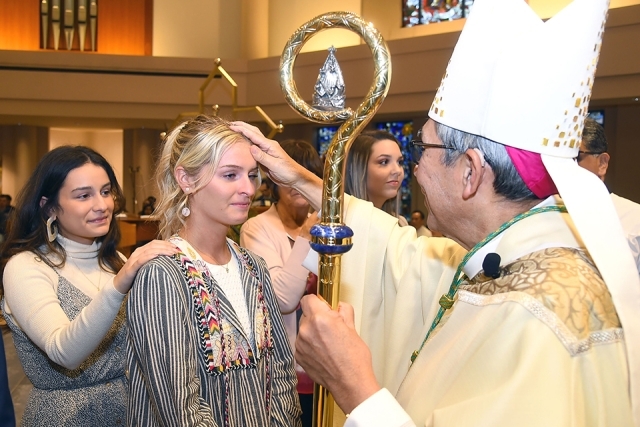 RCIA reception of sacraments in St. Thomas More Church