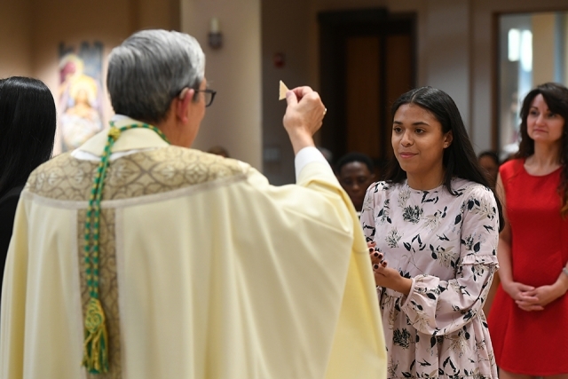 RCIA reception of sacraments in St. Thomas More Church