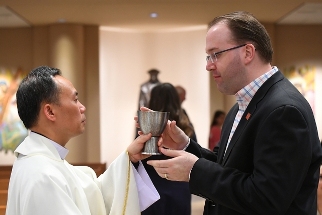 RCIA reception of sacraments in St. Thomas More Church