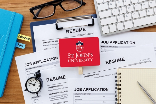 St. John's University logo with job fair materials