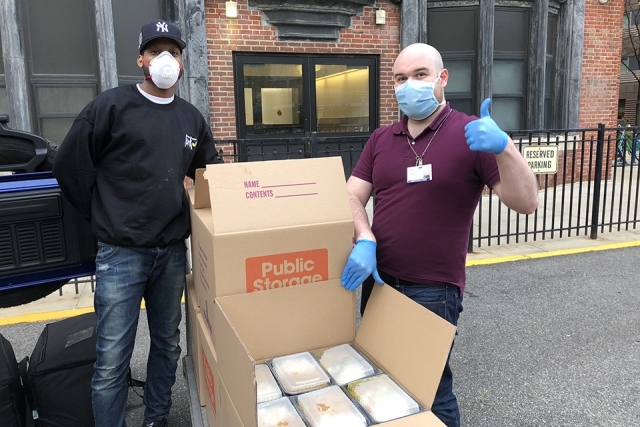 Healthcare workers receiving food donations