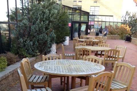 Empty tables outside Marillac Hall Terrace