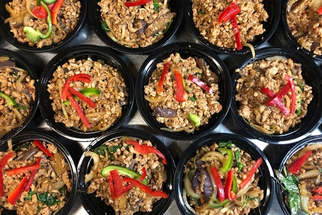 Bowls of food setup for distribution