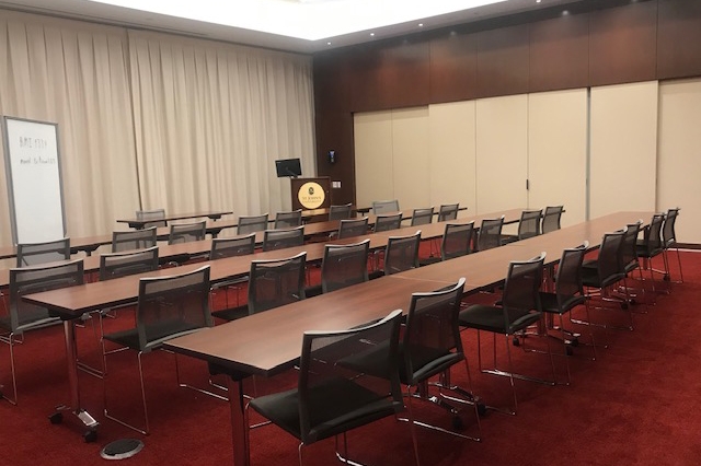 Empty Conference Room setup with Tables and Chairs