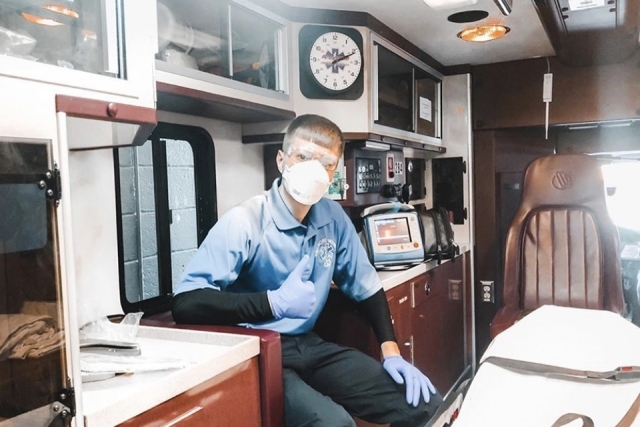 William Jutt sitting in EMT vehicle