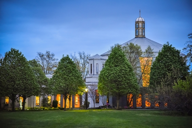 St. Thomas More Church at dusk 