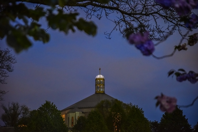 St. Thomas More Church against night sky