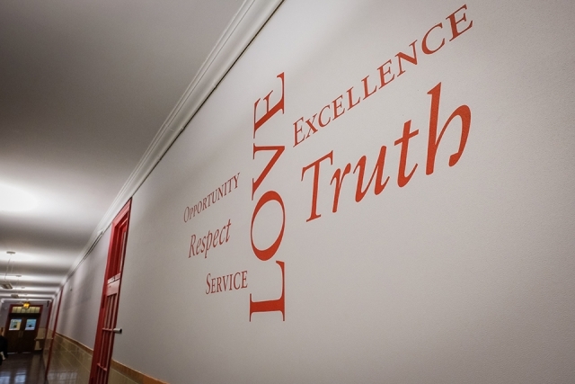St. John's Core Values displayed on wall