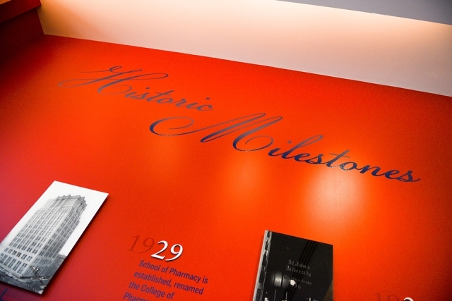 Timeline of St. John's University on a red wall