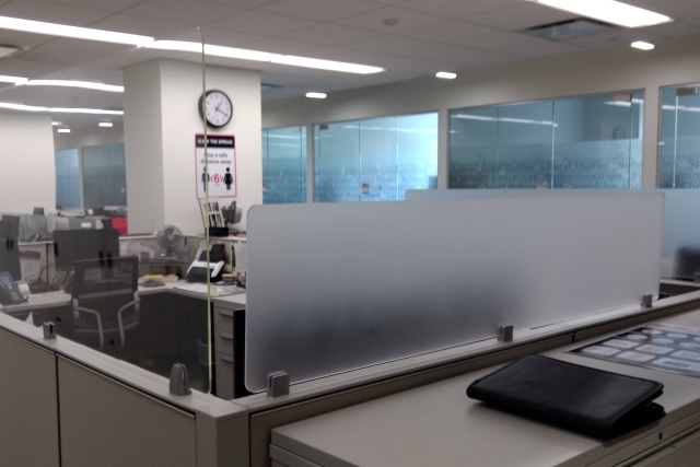 Cubicles with plexiglass up to protect occupants