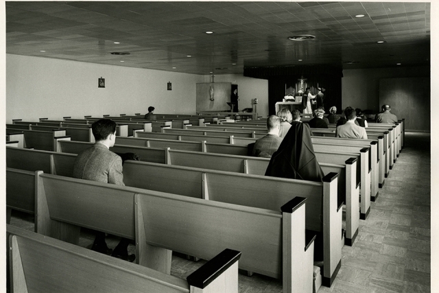 Black and white photo of Lourdes Hall interior