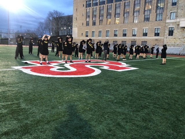 Cadets conduct stretching exercises after a challenging, but fun session of Physical Readiness Training (PRT). Physical fitness is an integral part of the military profession and PRT is used to foster good habits that can help reduce injuries. (circa January 2020)