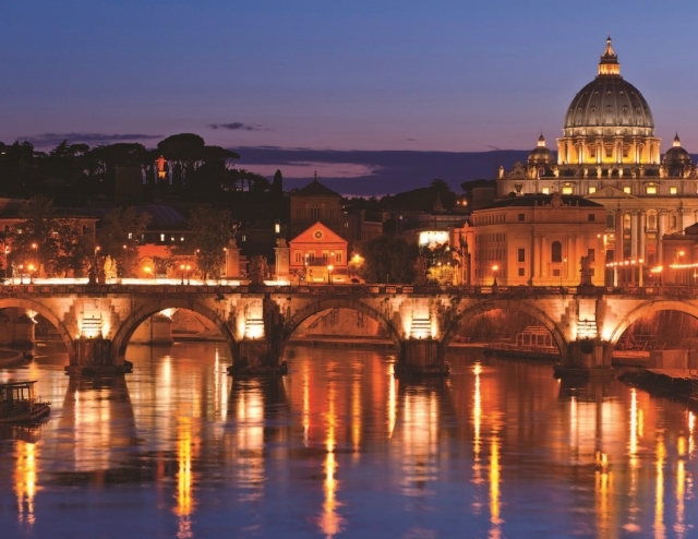 Evening shot of Rome reflecting in the Tiber River