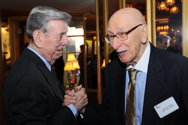 Jack Franzetti ’45UC, ’46G, ’56Ph.D. talking with Lou Carnesecca