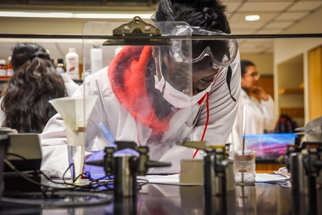 St. John's chemistry student working in a lab